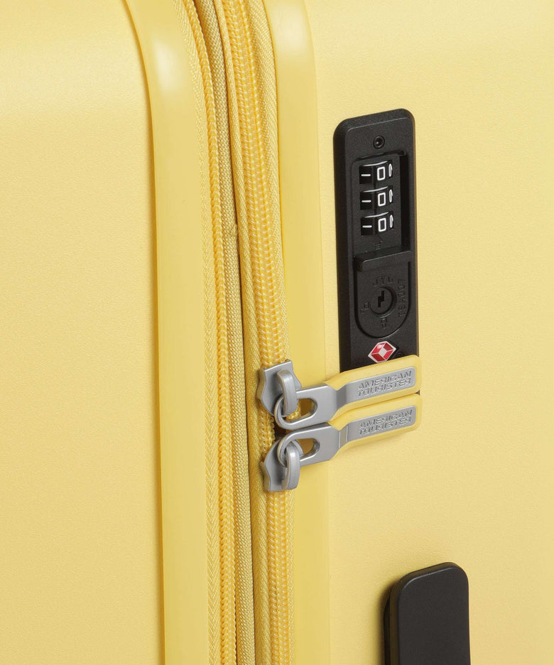 American Tourister Dynabelt Spinner (4 wheels) sunny yellow